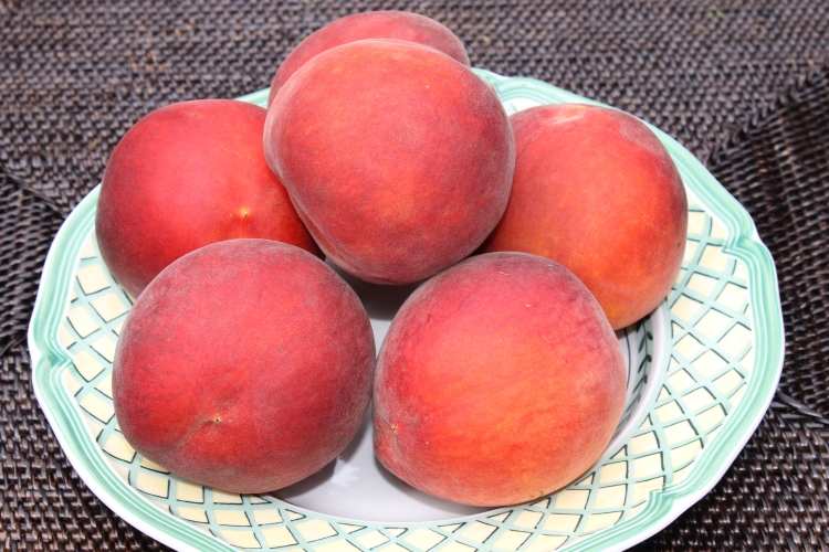 A Bowl Of Fresh Peaches
