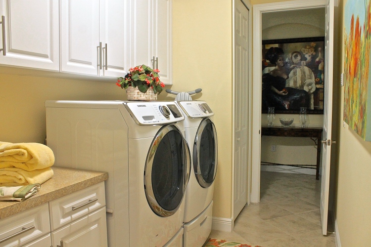The Laundry Room Is Directly Off The Entrance Foyer As Well As Through The Garage 